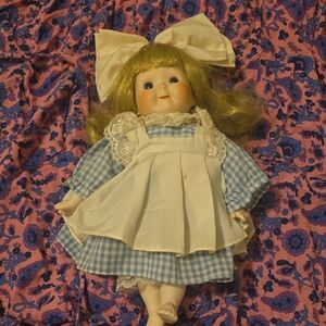 Charming Blue and White Doll with Bow